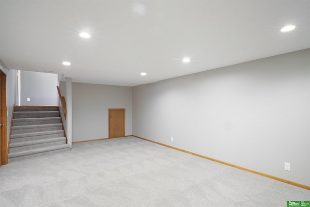 interior space featuring light colored carpet