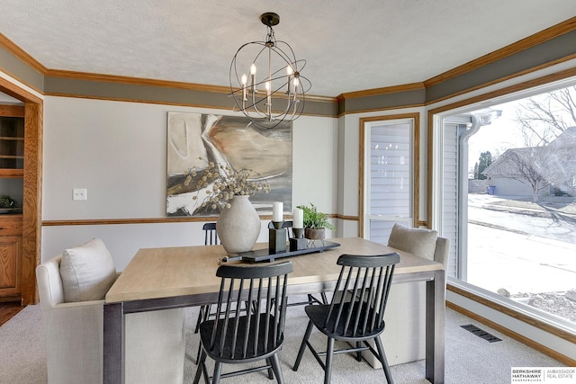 dining space with crown molding, light carpet, and a notable chandelier