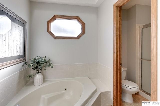 bathroom featuring tile patterned floors, shower with separate bathtub, and toilet