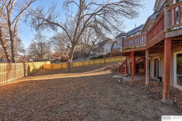 view of yard featuring a deck