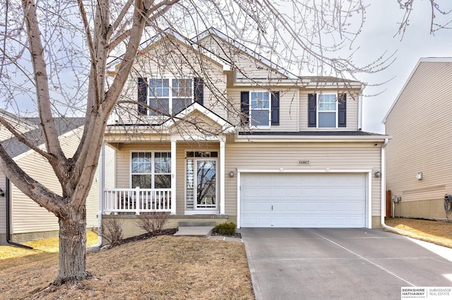 view of front of property with a garage