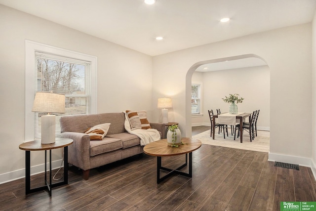 living room featuring dark hardwood / wood-style floors