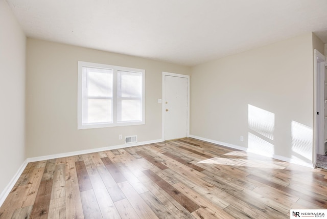 empty room featuring light hardwood / wood-style flooring