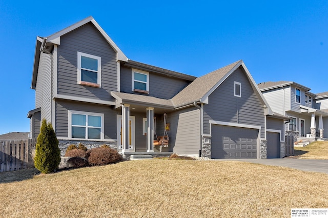 craftsman inspired home with a front yard