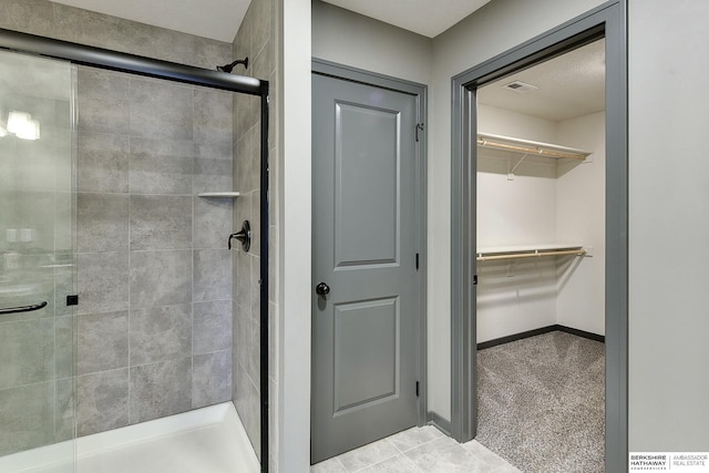 bathroom featuring an enclosed shower