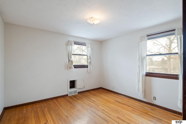 empty room featuring light hardwood / wood-style floors