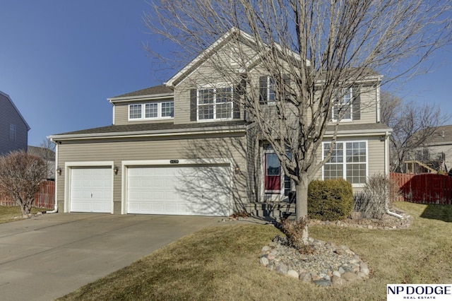 front facade featuring a garage and a front lawn