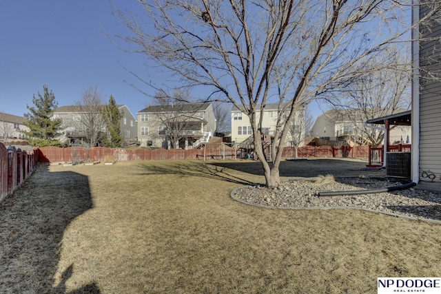 view of yard with central AC