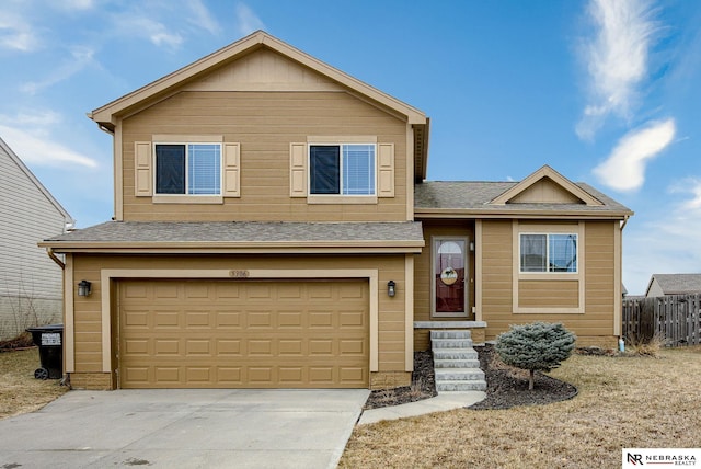 view of front of property featuring a garage