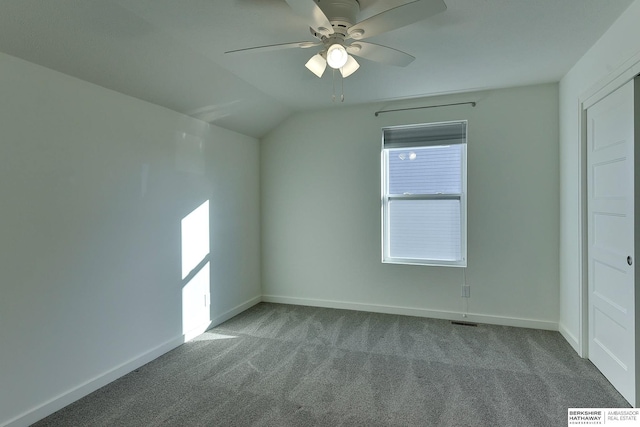 bonus room with vaulted ceiling, carpet flooring, and ceiling fan