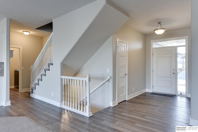 entryway with wood-type flooring