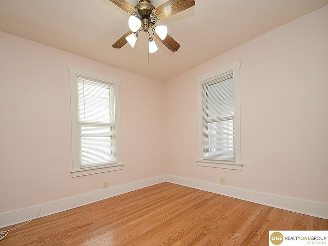 unfurnished room featuring ceiling fan and light hardwood / wood-style flooring