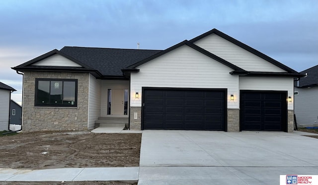 view of front of property with a garage