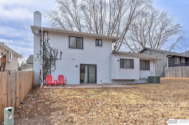 back of property featuring a patio and central AC unit