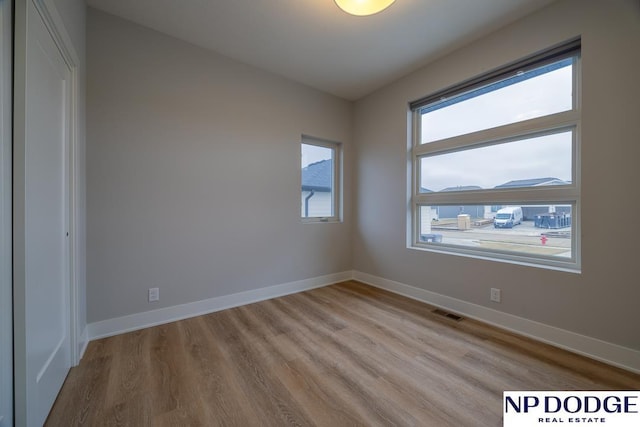 empty room featuring light hardwood / wood-style floors