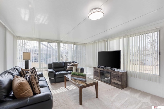 living area featuring light colored carpet