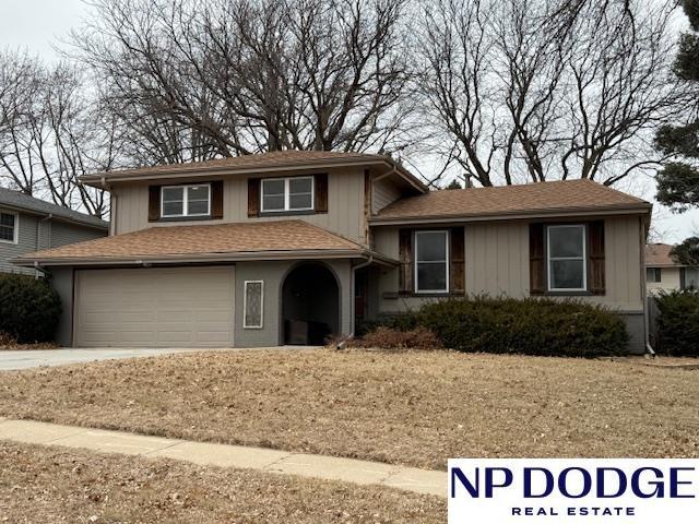 split level home with a garage