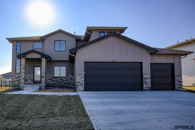 view of front of property with a garage