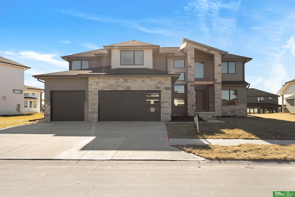 view of front of house with a garage