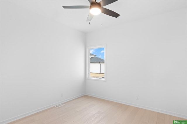 unfurnished room featuring ceiling fan and light hardwood / wood-style floors