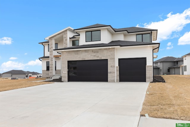 prairie-style house with a garage