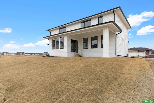 view of front of property featuring a front yard