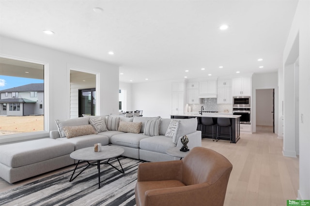 living room featuring light wood-type flooring