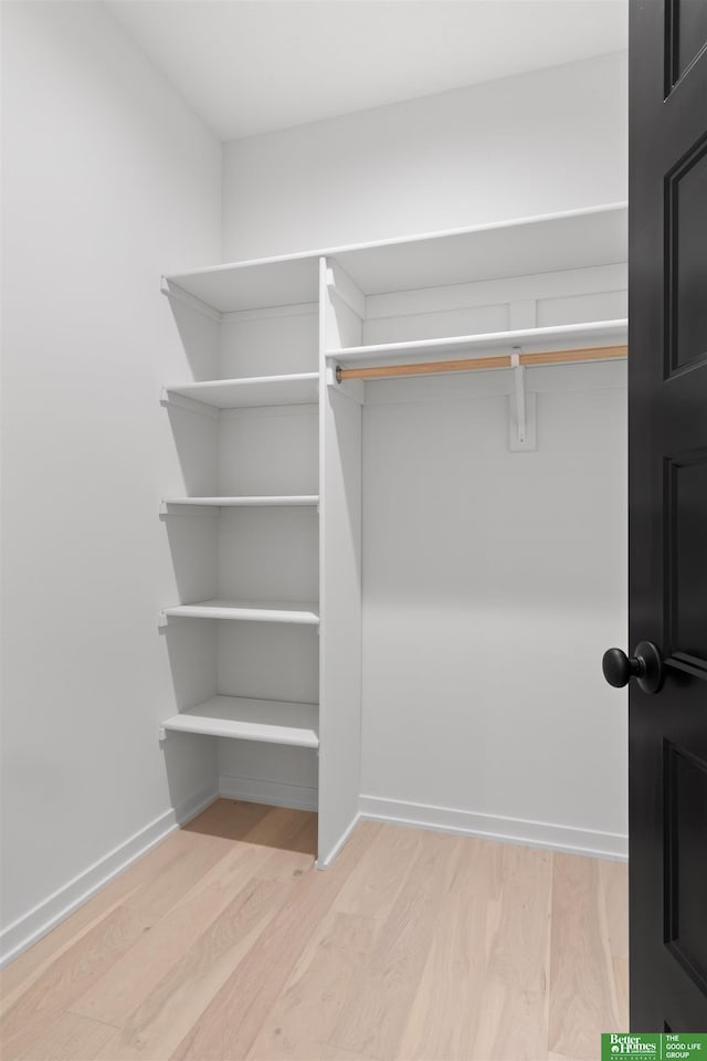 walk in closet featuring light wood-type flooring