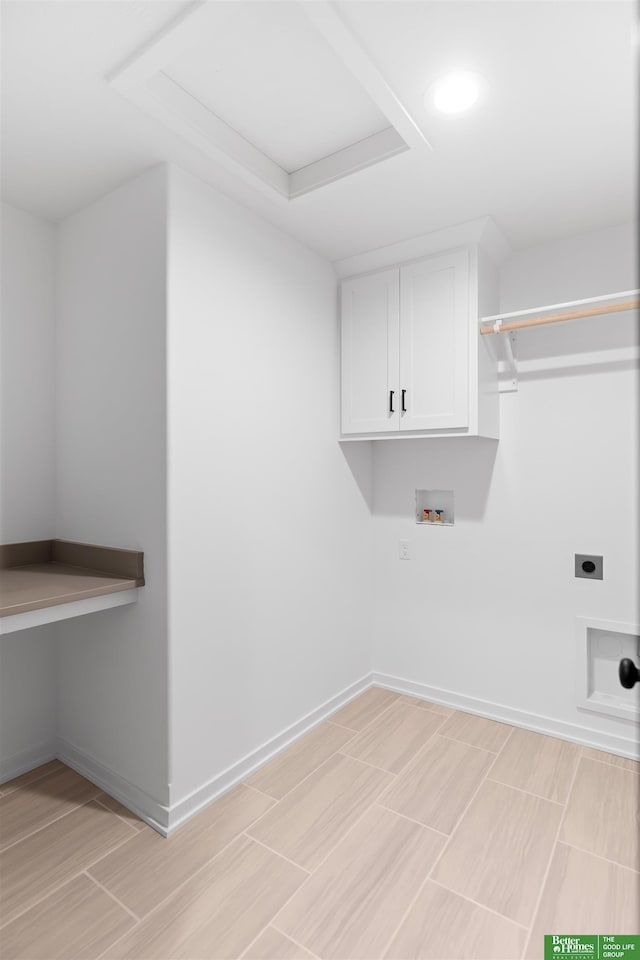 laundry room featuring cabinets, washer hookup, and hookup for an electric dryer