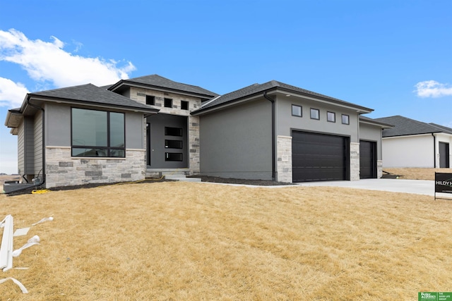 prairie-style house with a front lawn