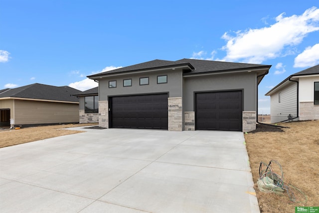 prairie-style home featuring a garage