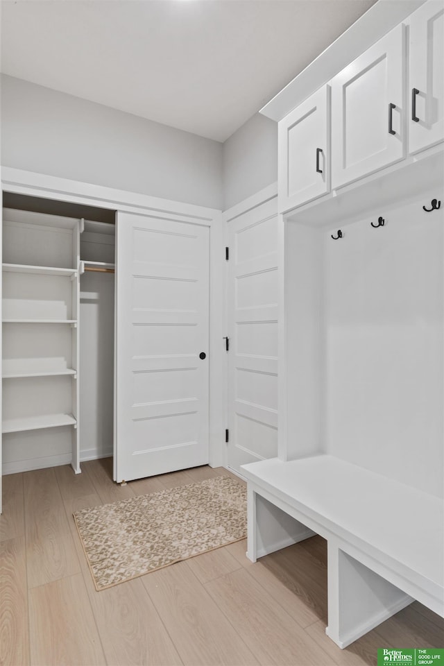 mudroom with light wood-type flooring