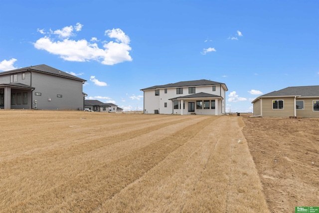 exterior space with a yard