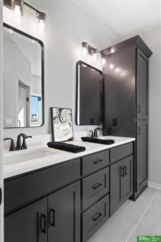 bathroom featuring tile patterned floors and vanity