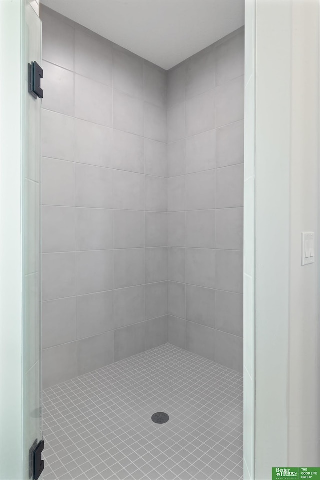 bathroom with an enclosed shower