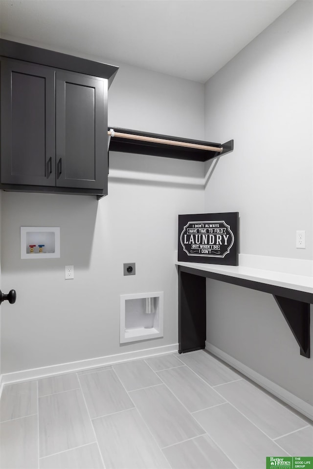 laundry room with cabinets, hookup for a washing machine, and electric dryer hookup