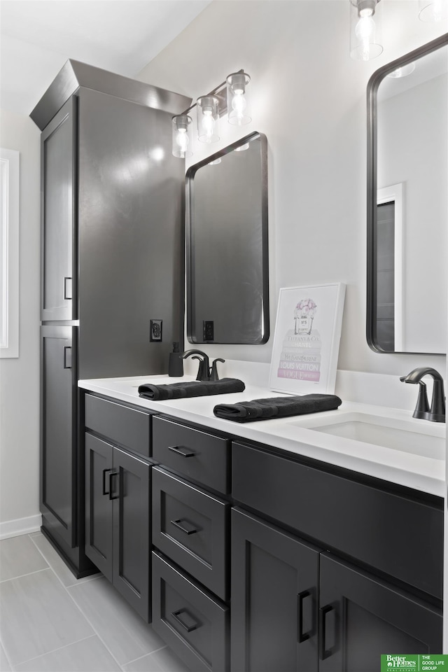 bathroom with vanity and tile patterned floors