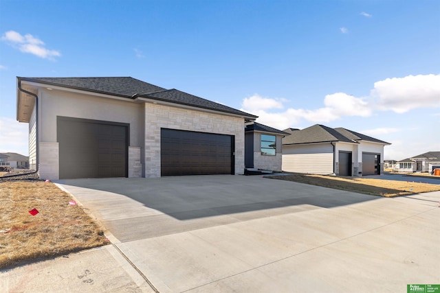 prairie-style house featuring a garage