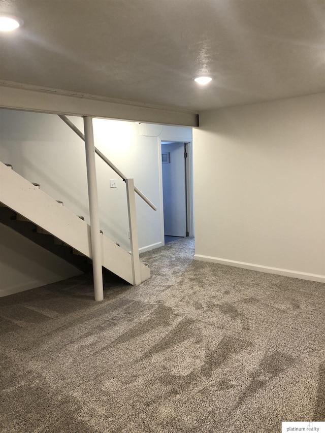 finished basement with carpet and baseboards