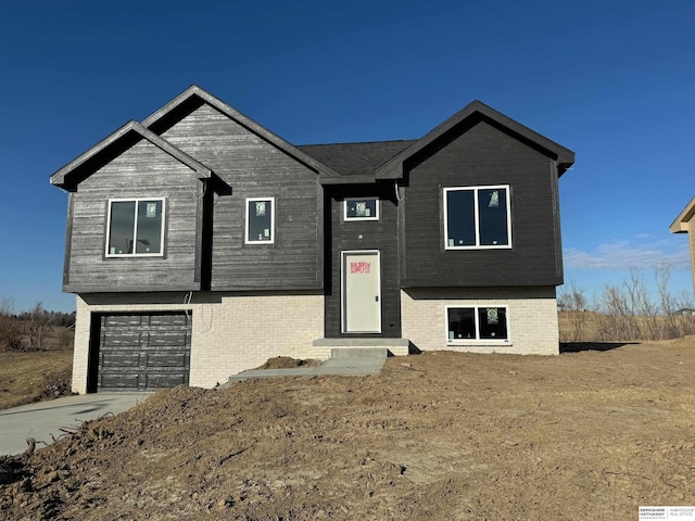 raised ranch with a garage