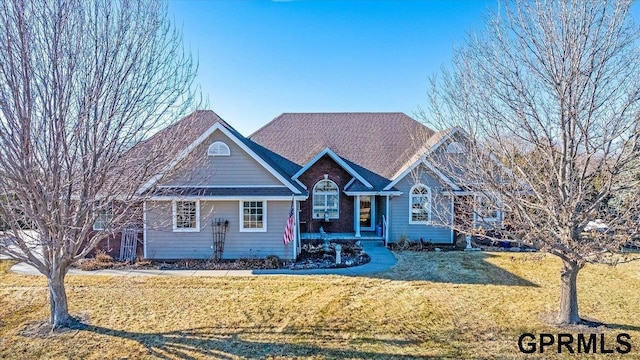 ranch-style house with a front yard