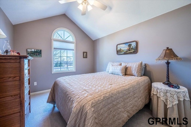 bedroom with light carpet, vaulted ceiling, and ceiling fan