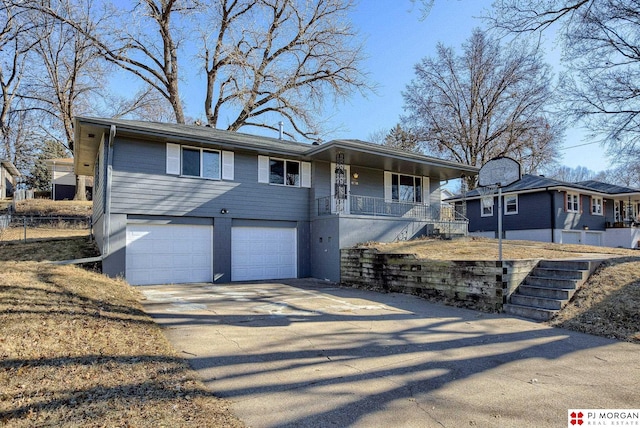 view of front of property with a garage