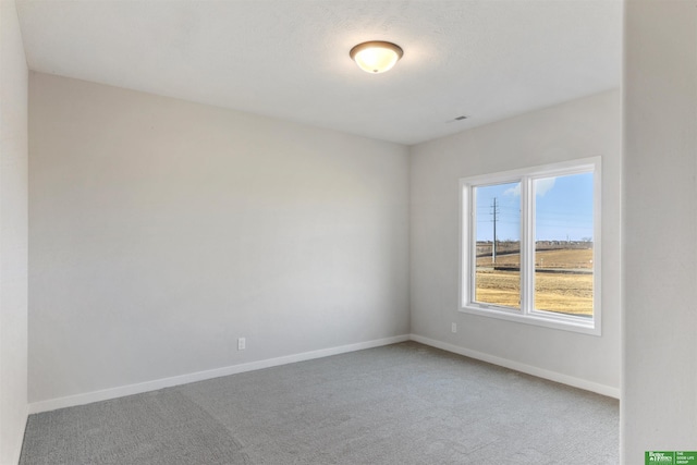 unfurnished room with carpet