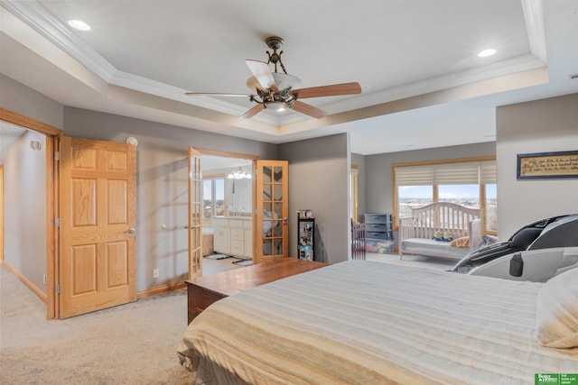 carpeted bedroom featuring connected bathroom, ornamental molding, access to outside, ceiling fan, and a raised ceiling