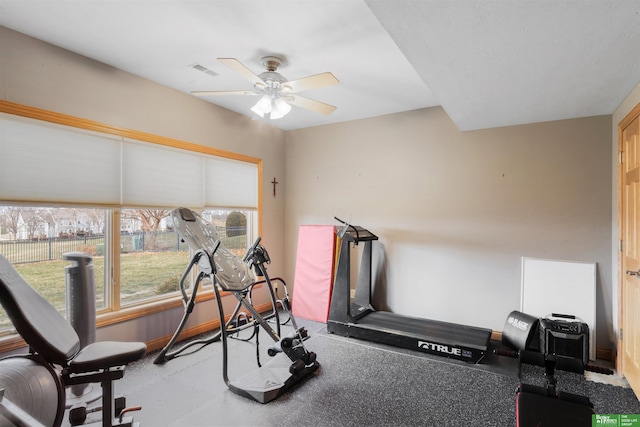 workout area with ceiling fan