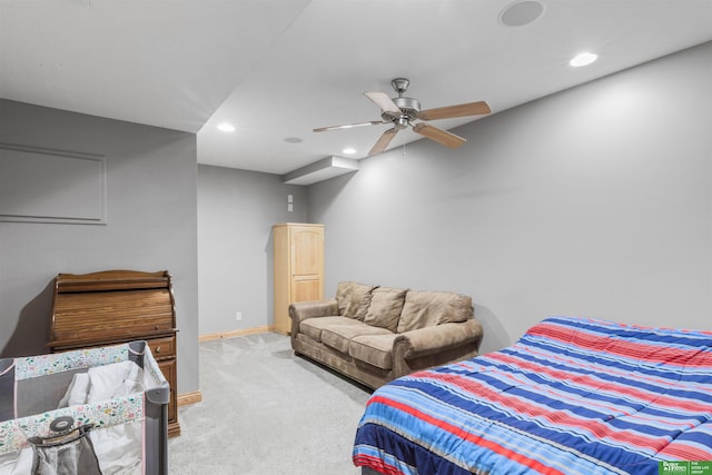 carpeted bedroom featuring ceiling fan