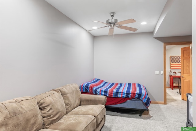 carpeted bedroom with ceiling fan