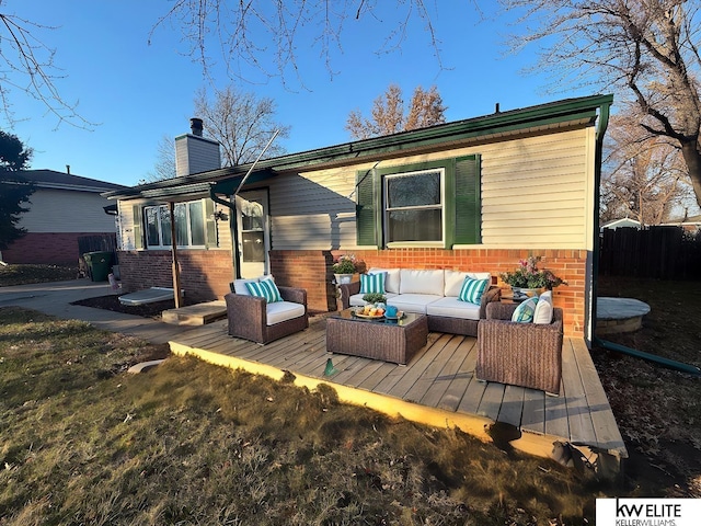 back of house featuring an outdoor hangout area and a deck