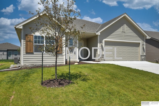 single story home featuring a garage and a front yard